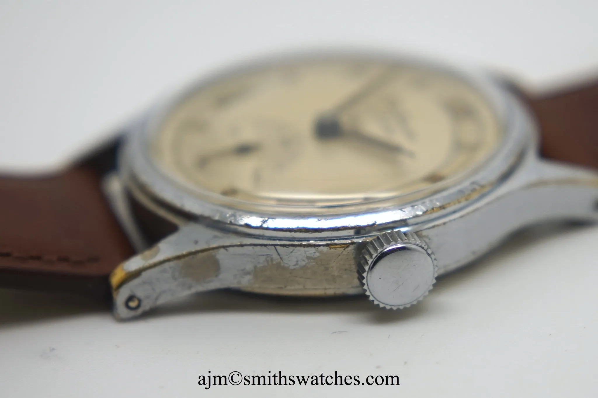 J W BENSON LONDON SMITHS MADE IN ENGLAND ROMAN NUMERAL DIAL DENNISON AQUATITE CASE C 1953