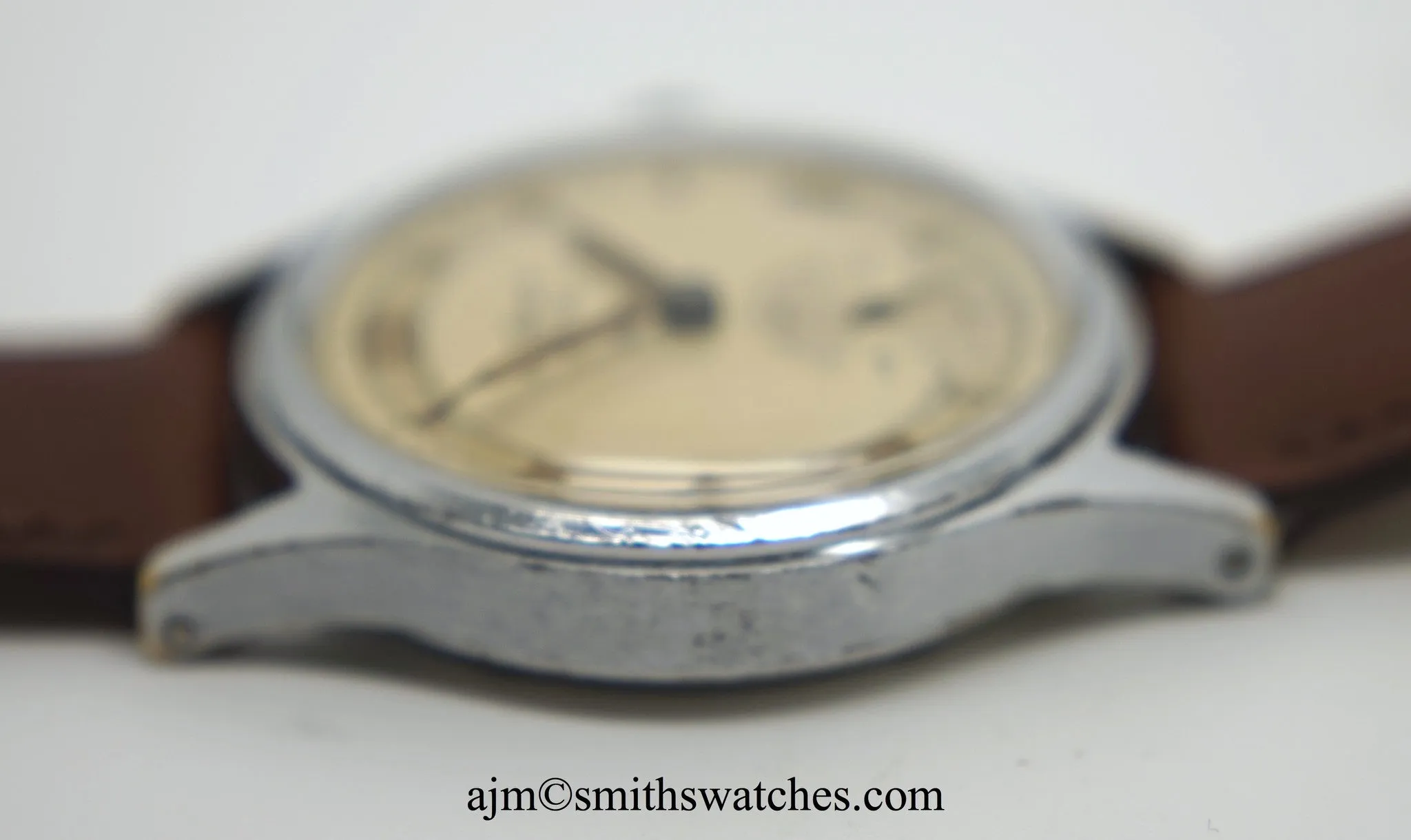 J W BENSON LONDON SMITHS MADE IN ENGLAND ROMAN NUMERAL DIAL DENNISON AQUATITE CASE C 1953