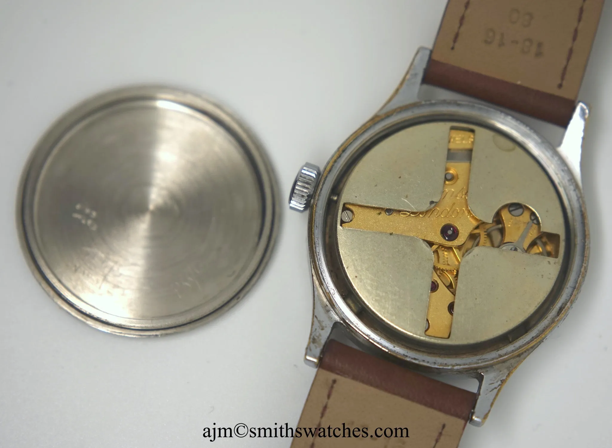 J W BENSON LONDON SMITHS MADE IN ENGLAND ROMAN NUMERAL DIAL DENNISON AQUATITE CASE C 1953