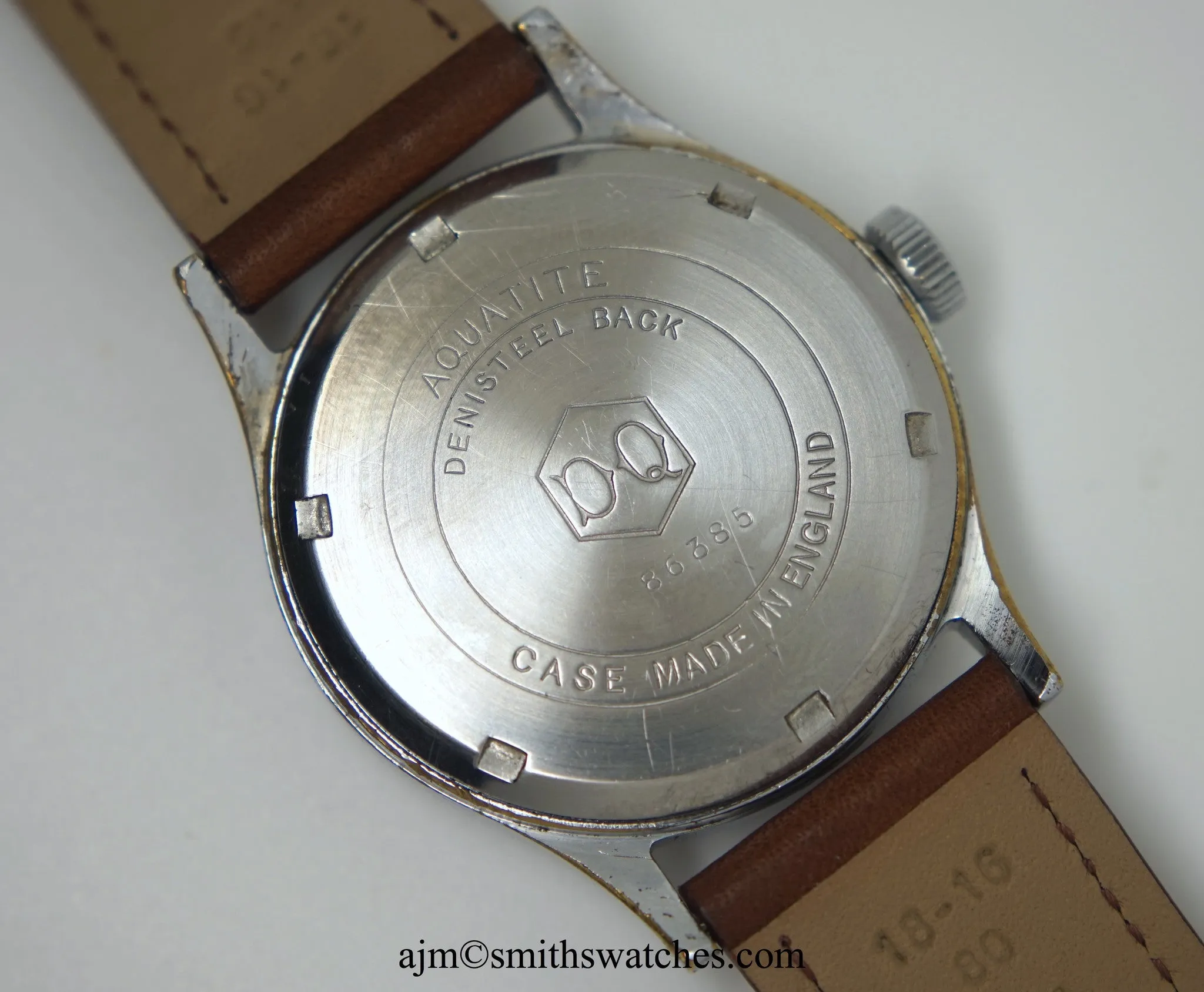J W BENSON LONDON SMITHS MADE IN ENGLAND ROMAN NUMERAL DIAL DENNISON AQUATITE CASE C 1953